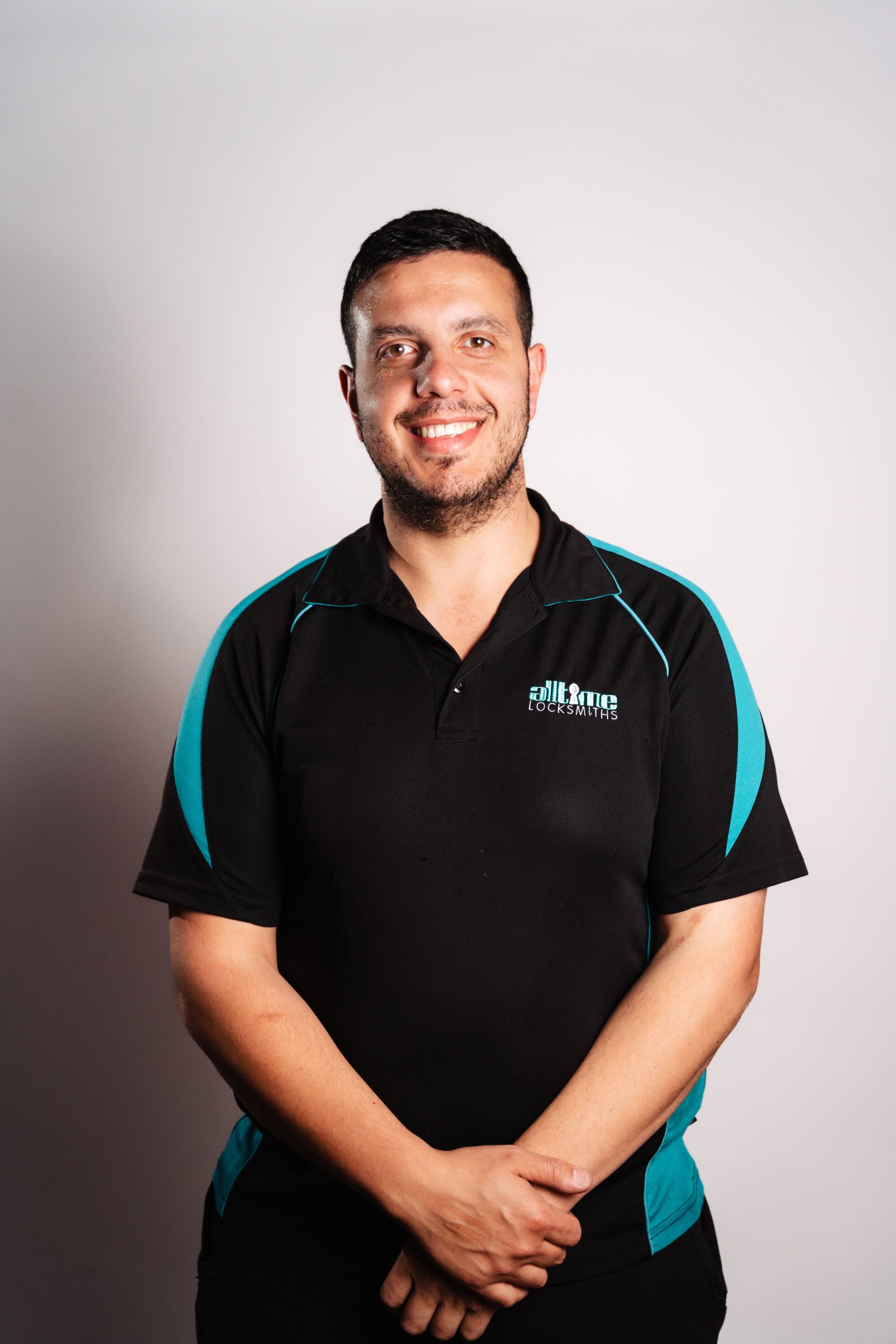 All Time Locksmiths team member in company uniform